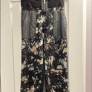 Pants- Lycra/ rayon with faux leather.